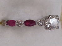 Image 4 of 9 of a N/A 18K GOLD DIAMOND AND RUBY RING