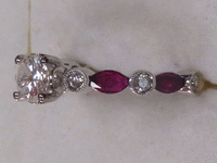Image 5 of 9 of a N/A 18K GOLD DIAMOND AND RUBY RING