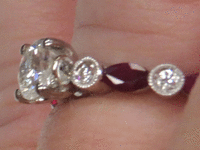 Image 8 of 9 of a N/A 18K GOLD DIAMOND AND RUBY RING