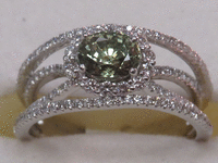 Image 1 of 9 of a N/A PLATINUM ALEXANDRITE CHRYSOBERYL AND DIAMOND RING