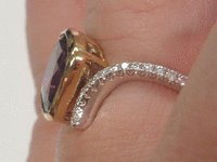 Image 4 of 7 of a N/A 18K GOLD SAPPHIRE & DIAMOND RING