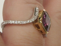 Image 5 of 7 of a N/A 18K GOLD SAPPHIRE & DIAMOND RING