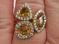 Image 4 of 8 of a N/A 18K GOLD YELLOW SAPPHIRE & DIAMOND