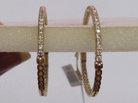 Image 2 of 3 of a N/A 14K YELLOW GOLD & DIAMOND OVAL HOOP