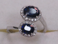 Image 1 of 9 of a N/A 18K BLUE SAPPHIRE & DIAMOND RING