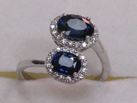 Image 2 of 9 of a N/A 18K BLUE SAPPHIRE & DIAMOND RING