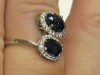 Image 7 of 9 of a N/A 18K BLUE SAPPHIRE & DIAMOND RING