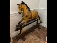 Image 1 of 1 of a 1920 ANTIQUE WOODEN HORSE N/A