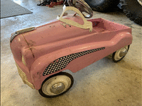 Image 1 of 1 of a N/A PINK PEDAL CAR PUSH CAR