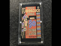 Image 1 of 1 of a N/A 1969 WOODSTOCK STAGE IN COMMEMORATIVE CASE