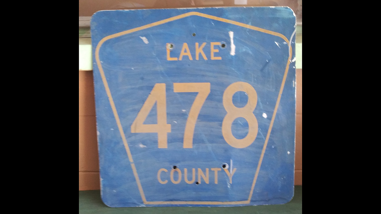 0th Image of a N/A LAKE COUNTY METAL SIGN