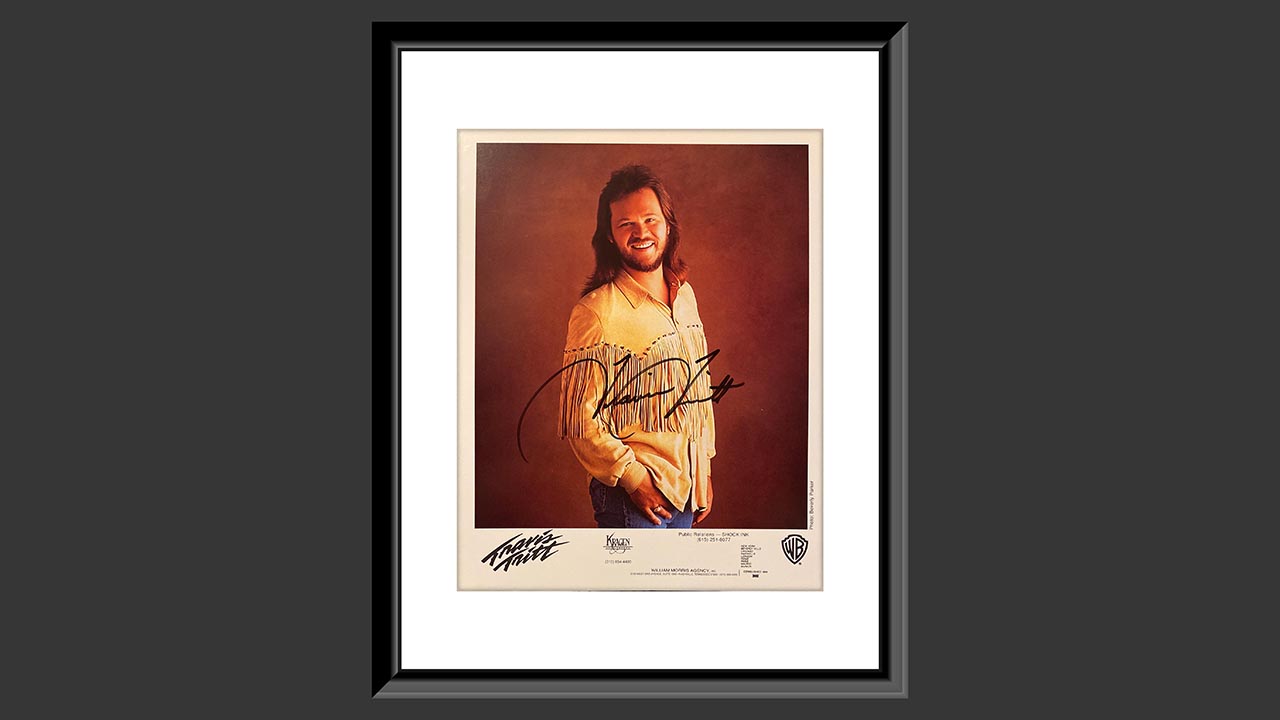 0th Image of a N/A TRAVIS TRITT SIGNED PHOTO