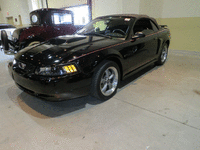 Image 1 of 13 of a 2002 FORD MUSTANG