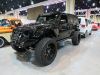 Image 1 of 13 of a 2017 JEEP WRANGLER UNLIMITED SAHARA