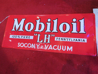 Image 1 of 1 of a N/A MOBIL OIL STEEL SIGN EMBOSSED