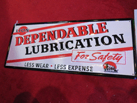 Image 1 of 1 of a N/A LION  STEEL SIGN EMBOSSED LION DEPENDENBALE LUBRICTATION STEEL SIGN