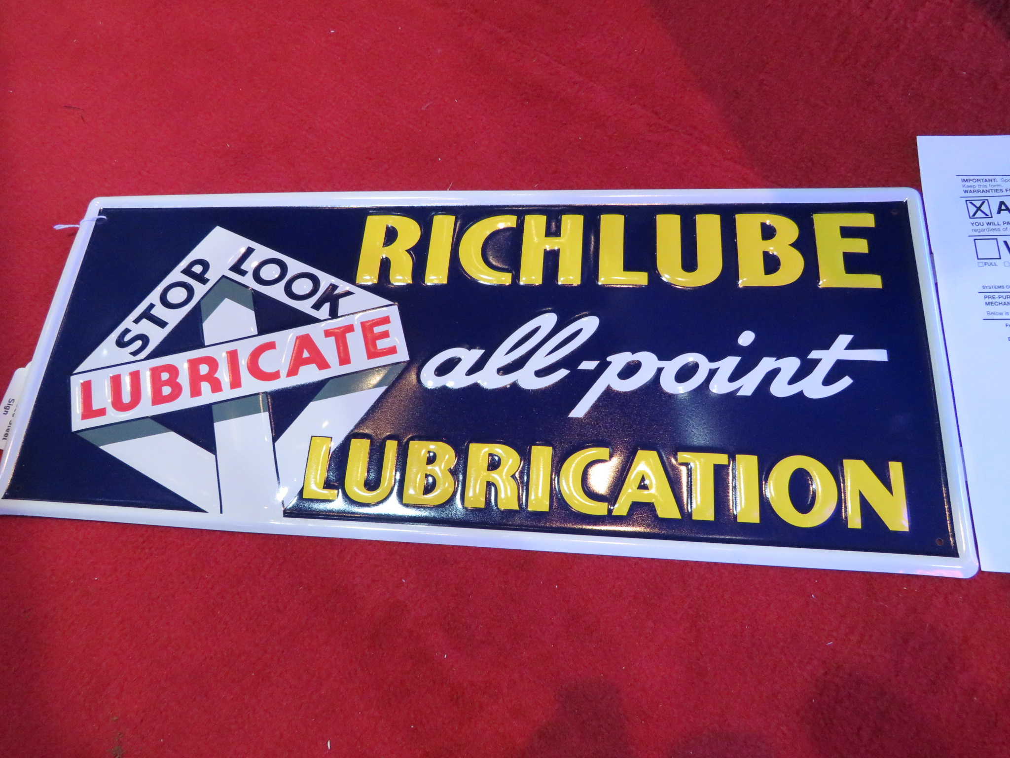 0th Image of a N/A RICHLUBE STEEL SIGN EMBOSSED RICHLUBE LUBERICATION STEEL SIGN