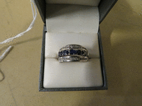 Image 1 of 2 of a N/A WHITE GOLD SAPPHIRE DIAMOND RING