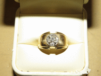 Image 1 of 2 of a N/A GOLD AND DIAMOND RING