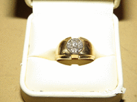 Image 2 of 2 of a N/A GOLD AND DIAMOND RING