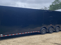 Image 1 of 5 of a 2024 ENCLOSED TRAILER