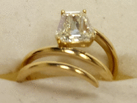 Image 2 of 15 of a N/A 18K YELLOW GLD CALF STEP DIAMOND