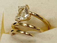 Image 6 of 15 of a N/A 18K YELLOW GLD CALF STEP DIAMOND