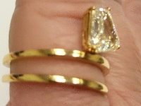Image 10 of 15 of a N/A 18K YELLOW GLD CALF STEP DIAMOND