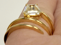 Image 11 of 15 of a N/A 18K YELLOW GLD CALF STEP DIAMOND