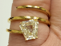 Image 12 of 15 of a N/A 18K YELLOW GLD CALF STEP DIAMOND