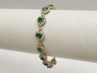 Image 6 of 7 of a N/A 14K GOLD EMERALD DIAMOND