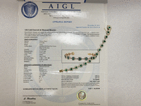 Image 7 of 7 of a N/A 14K GOLD EMERALD DIAMOND