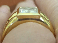 Image 7 of 9 of a N/A 18K GOLD DIAMOND SOLITAIRE