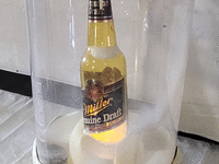 Image 2 of 4 of a N/A MILLER GENUINE DRAFT SNOW GLOBE