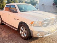 Image 2 of 6 of a 2016 RAM 1500 SLT
